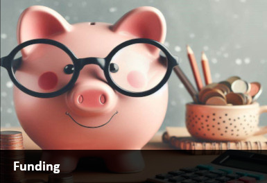 Funding Image - piggybank on a desk